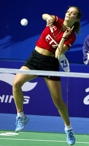 Tine Rasmussen of Denmark returns the shuttle during the first round match against China's Liu Jie in the women's singles of Li Ning China Open Badminton Super Series 2008 in Shanghai, China, Nov. 19, 2008.[Xinhua]