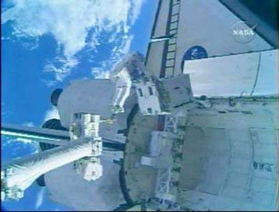 The US space shuttle Endeavour as seen from the International Space Station. Two astronauts from NASA's space shuttle Endeavour, docked at the International Space Station, were preparing for the first of four planned spacewalks of the 15-day mission. 