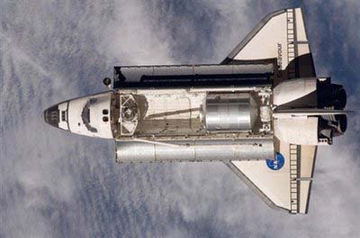 The US space shuttle Endeavour as seen from the International Space Station. Two astronauts from NASA's space shuttle Endeavour, docked at the International Space Station, were preparing for the first of four planned spacewalks of the 15-day mission. 