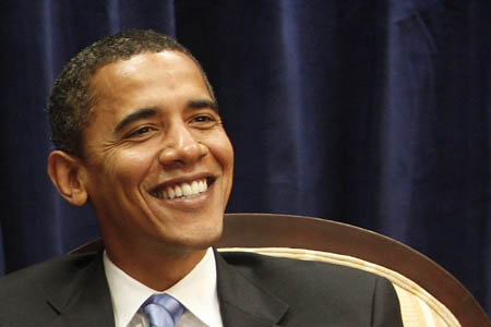 President-elect Barack Obama smiles during a meeting in Obama's transition office in Chicago, November 17, 2008.