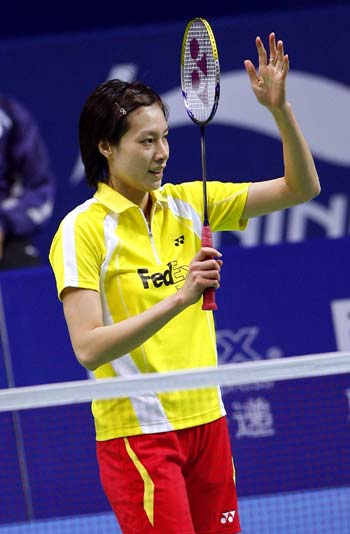 China's Xie Xingfang celebrates after winning a game at the ongoing China Open Badminton event in Shanghai November 19, 2008. 