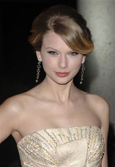 Singer Taylor Swift arrives at the 2008 BMI Country Awards, in Nashville, Tenn., Tuesday, Nov. 11, 2008.
