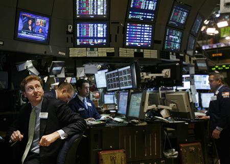 Traders work on the floor of the New York Stock Exchange, November 20, 2008. 