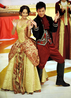 Hong Kong actor Lam Fung(R) performs dancing with Kate Tsui Tsz Shan at a gala to celebrate the 41st anniversary of the founding of Hong Kong television TVB in Hong Kong, south China, on Nov. 19, 2008. 