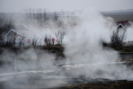 The village is surrounded by white mist of geyser in north Reykjavik, capital of Iceland, Nov. 19, 2008.