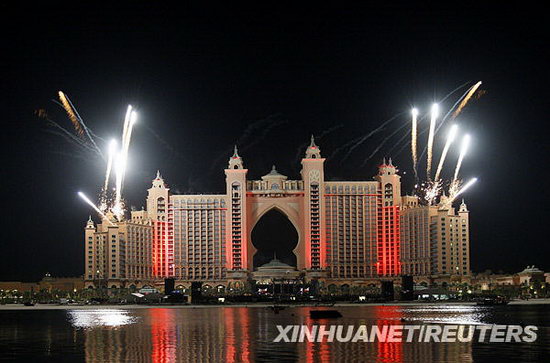 Fireworks are seen during the grand opening of Atlantis, The Palm in Dubai November 21, 2008. The $1.5 billion mega resort with 1,539 rooms is the first resort to open on Dubai's man-made Palm Jumeirah island.
