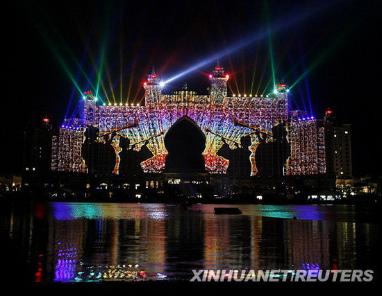 A light display is illuminated during the grand opening of Atlantis, The Palm in Dubai November 21, 2008. The $1.5 billion mega resort with 1,539 rooms is the first resort to open on Dubai's man-made Palm Jumeirah island.