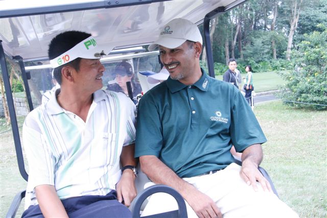  Two of today's winners: Lin wen-tang and Jeev Milkha Singh both had something to smile about.