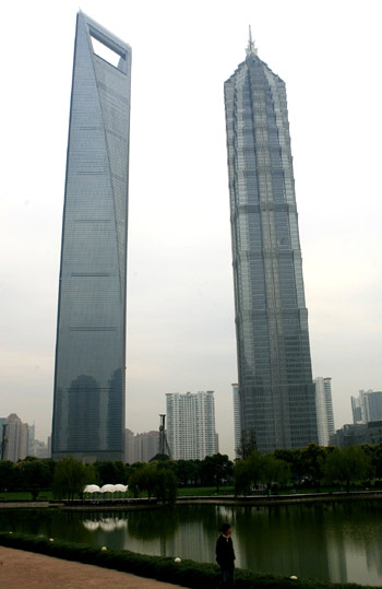 Picture taken on Nov. 22, 2008 shows the Shanghai World Financial Center (L) and the neighboring Jinmao Tower in Shanghai, east China. The Shanghai World Financial Center was named on Thursday as the world's best skyscraper completed this year by the Council on Tall Buildings and Urban Habitat, a Chicago-based group of architects and engineers.