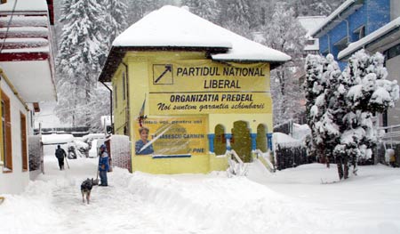 A street is covered by heavy snow in Predeal, Brasov County of Romania, Nov. 22, 2008. Romanian national weather bureau released snowstorm yellow alarm to 26 of the total 41 counties in the country since the first snow of the year falled on Nov. 21.