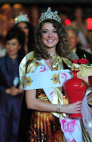 Mariia Lakimuk from Ukraine poses after she won the champion of the 20th Miss World Model in the Folk Culture Village of Splendid China in Shenzhen, south China's Guangdong Province, Nov. 22, 2008. The final contest of the 20th Miss World Model ended here on Saturday with over 60 models engaging in.