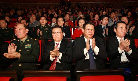  Li Changchun (2nd, L), member of the Standing Committee of the Political Bureau of the Communist Party of China Central Committee and Chinese Vice President Xi Jinping (2nd, R) applaud while watching the soiree marking the 110th anniversary of the birth of Liu Shaoqi, late Chinese President and Communist leader, in Beijing, China, on Nov. 24, 2008.