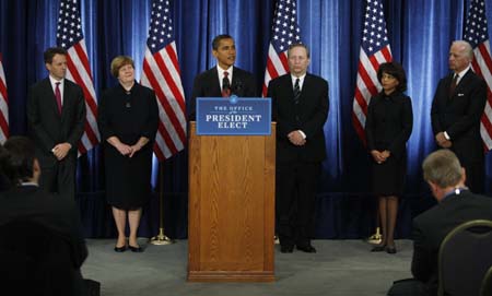 US President-elect Barack Obama (3nd L) unveils his economic policy team in Chicago November 24, 2008. From left are Treasury Secretary-designate, New York Federal Reserve Bank President Timothy Geithner, Council of Economic Advisers Chair-designate Christina Romer, Obama, National Economic Council Director-designate Lawrence Summers, Domestic Policy Council Director-designate Melody Barnes and Vice President-designate Joe Biden. 