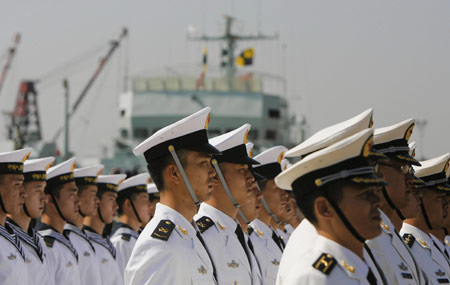 Soldiers of the upcoming navy unit of Chinese People's Liberation Army garrison troops in the Hong Kong Special Administrative Region (HKSAR) line up upon their arrival at the Stonecutters Island Naval Base of Hong Kong, south China, Nov. 25, 2008. The Chinese People's Liberation Army garrison troops in HKSAR conducted on Tuesday its 11th troop rotation since it assumed Hong Kong's defense responsibility on July 1, 1997. 