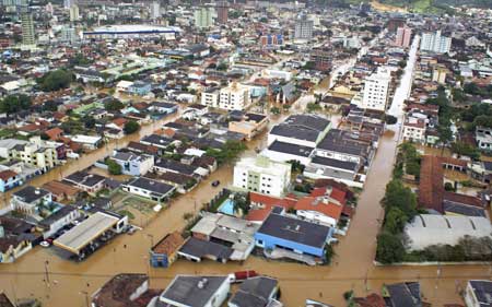 A view of the flooded Ilhota city in the Brazilian state of Santa Catarina Nov. 24, 2008. Rescue workers rushed to help stricken residents in southern Brazil on Monday after landslides and floods caused by heavy rain killed at least 59 people and forced more than 43,000 from their homes. The state of Santa Catarina declared an emergency as rescuers used helicopters and motorboats to reach those displaced or stranded by the floods after days of torrential rain. Picture taken Nov. 24, 2008. 