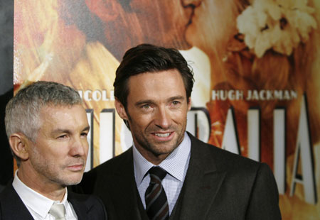 Actor Hugh Jackman arrives with director Baz Luhrmann (L) for the premiere of the film 'Australia' in New York November 24, 2008. 