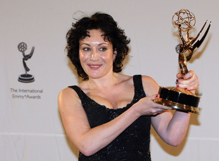 British actress Lucy Cohu celebrates after winning the Best Performance by an Actress for her work in 'Forgiven' at the 36th International Emmy Awards in New York, Nov. 24, 2008. The 36th International Emmy Awards was presented by the International Academy of Television Arts and Sciences on Monday to promote excellence in international television programming. 
