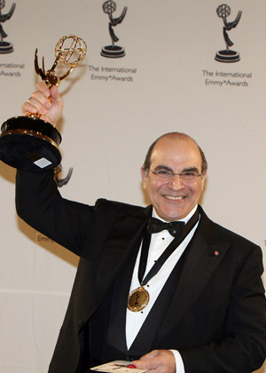 British actor David Suchet celebrates after winning the Best Performance for an Actor for his role in 'Maxwell' at the 36th International Emmy Awards Gala in New York, Nov. 24, 2008. 
