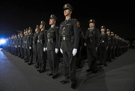 Chinese People's Liberation Army troops stand in their formation during troop rotation at a barrack in Hong Kong, south China, Nov. 25, 2008. The Chinese People's Liberation Army garrison troops in HKSAR conducted on Tuesday its 11th troop rotation since it assumed Hong Kong's defense responsibility on July 1, 1997. 