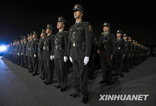 Chinese People's Liberation Army troops stand in their formation during troop rotation at a barrack in Hong Kong, south China, Nov. 25, 2008. The Chinese People's Liberation Army garrison troops in HKSAR conducted on Tuesday its 11th troop rotation since it assumed Hong Kong's defense responsibility on July 1, 1997. (Xinhua Photo)