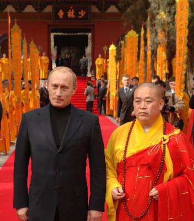   Shi Yongxin (right), the abbot of the famed Shaolin temple in Henan and Russian Prime Minister Vladimir Putin [File]