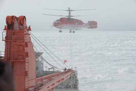 A helicopter carries navigational kerosene from China's Antarctic ice breaker Xuelong, or Snow Dragon, to China's Zhongshan Antarctic Station, on Nov. 26, 2008. 