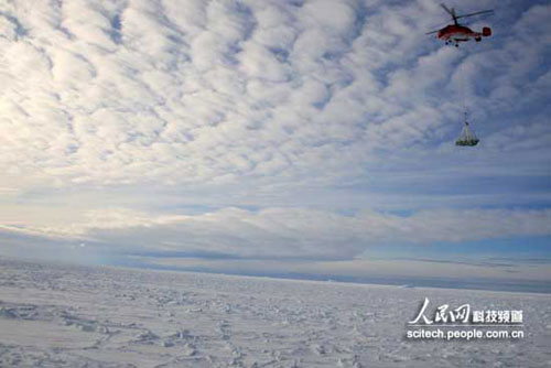 A helicopter delivers aviation kerosene off from China's Antarctic icebreaker Xuelong, or Snow Dragon, to Zhongshan station, China's second research station at the South Pole, on Wednesday, November 26, 2008. 