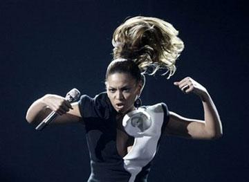 Beyonce performs at the American Music Awards in Los Angeles. [Matt Sayles/AP Photo] 