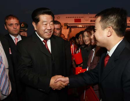 Jia Qinglin (Front,L), chairman of the National Committee of the Chinese People's Political Consultative Conference (CPPCC), is welcomed upon his arrival at the airport in Ankara, capital of Turkey, Nov. 26, 2008. Jia started an official goodwill visit to Turkey on Wednesday. 