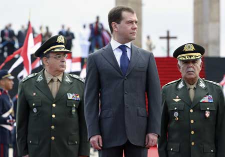 President Dmitry Medvedev (C) reviews the honour guard during a wreath laying ceremony at the Second World War monument in Rio de Janeiro Nov. 25, 2008. 