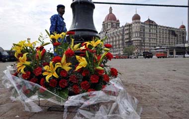 Flowers are placed in front of the Taj Mahal Hotel to commemorate the victims in the terror attacks in Mumbai, India, Nov. 30, 2008. India's longest terror nightmare that lasted for almost 59 hours ended Saturday.