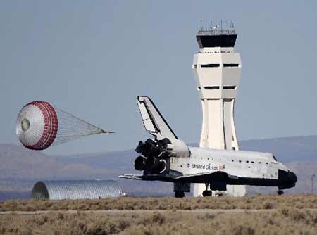 The U.S. space shuttle Endeavour deploys a parachute after touching down at Edwards Air Force Base in California November 30, 2008. Endeavour landed safely in California Sunday afternoon after a 16-day trip, as unfavorable weather conditions in Florida prevented the shuttle from landing in its home base in Cape Canaveral. 