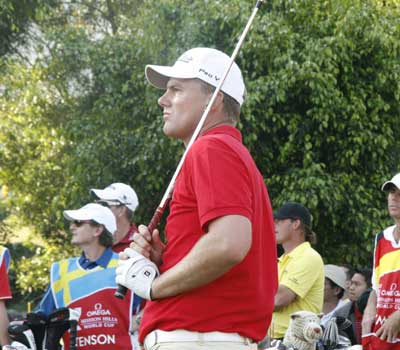 Smooth as you like - Karlsson surveys another textbook strike on the tee at 17.