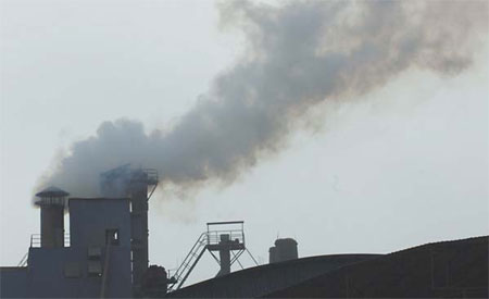 An industrial plant in Qingzhen city, Guizhou province, discharges smoke. Some local governments are degrade the environments in the name of maintaining stable economic growth. [China Daily]