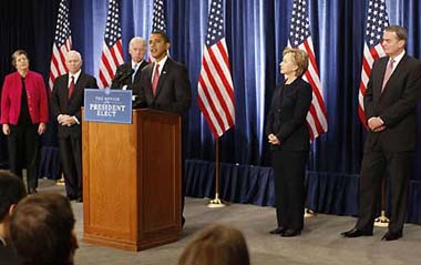 President-elect Barack Obama takes questions from reporters during a news conference in Chicago, Monday, Dec. 1, 2008, with, from left to right: Attorney General-designate Eric Holder; Homeland Security Secretary-designate Janet Napolitano; Defense Secretary Robert Gates; Vice President-elect Joe Biden; Secretary of State-designate Sen. Hillary Rodham Clinton, D-N.Y.; National Security Adviser-designate Ret. Marine Gen. James Jones; and United Nations Ambassador-designate Susan Rice.[Xinhua/Reuters]