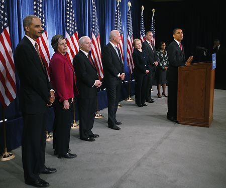 U.S. President-elect Barack Obama (R) stands with his national security team nominees Eric Holder (Attorney General), Arizona Governor Janet Napolitano (Head of Homeland Security), Robert Gates (continuing as Secretary of Defense), Vice President-elect Joe Biden, Senator Hillary Clinton (Secretary of State), retired Marine General James Jones (National Security Advisor) and Susan Rice (U.S. Ambassador to the United Nations) (L-R) during a news conference in Chicago December 1, 2008.[Xinhua/Reuters]