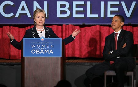 U.S. Democratic presidential nominee Barack Obama (R) and Senator Hillary Rodham Clinton attend a money raising meeting in New York, the United States, in this file photo taken on July 10, 2008. U.S. President-elect Barack Obama nominated Senator Hillary Rodham Clinton for Secretary of State at a news conference in Chicago on Monday.