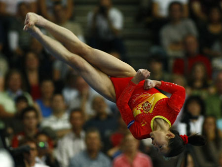 Cheng Fei of China performs on the vault to win the gold medal in the women's final at the 40th World Artistic Gymnastics Championships in Stuttgart September 8, 2007. 