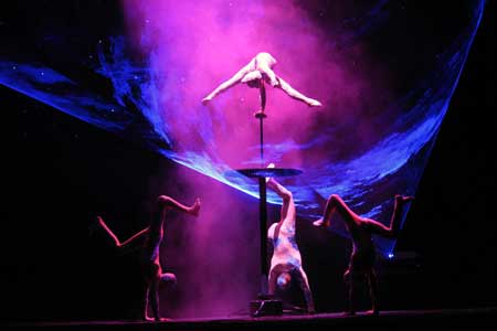 The acrobats perform on the stage during the awarding ceremony of the 7th National Acrobatic Contest held in Shenzhen, south China's Guangdong Province, Nov. 28, 2008. 