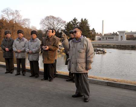 his undated photo released on Dec. 2, 2008 by the official Korean Central News Agency (KCNA) shows Kim Jong Il (R), top leader of the Democratic People's Republic of Korea (DPRK), inspecting a Pyongyang zoo which is under reconstruction.[Xinhua/KCNA]