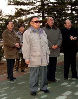 This undated photo released on Dec. 2, 2008 by the official Korean Central News Agency (KCNA) shows Kim Jong Il (C), top leader of the Democratic People's Republic of Korea (DPRK), inspecting a Pyongyang zoo which is under reconstruction.[Xinhua/KCNA]