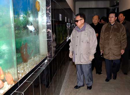 This undated photo released on Dec. 2, 2008 by the official Korean Central News Agency (KCNA) shows Kim Jong Il (C), top leader of the Democratic People's Republic of Korea (DPRK), inspecting a Pyongyang zoo which is under reconstruction.[Xinhua/KCNA]