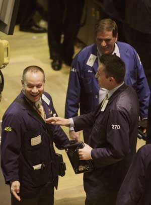 Traders work on the floor of the New York Stock Exchange, Dec. 2, 2008. U.S.