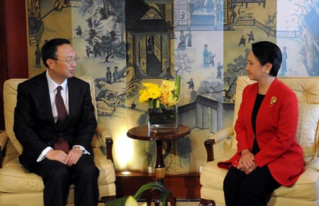 Chinese Foreign Minister Yang Jiechi(L) meets with Philippine President Gloria Macapagal- Arroyo in Hong Kong, China, on Dec. 2, 2008. The two sides discussed Sino-Philippine bilateral relations on the sidelines of the Clinton Global Initiative (CGI) Asia Meeting. (Xinhua/Wong Pun Keung) 