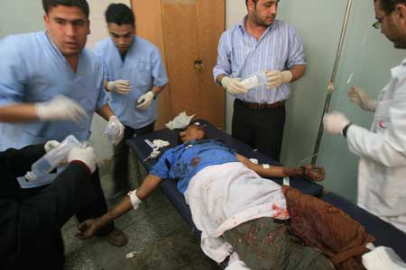 A wounded Palestinian man is treated at the Abu Yousef al-Najjar hospital in southern Gaza Strip town of Rafah, Dec. 2, 2008. 