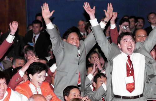 China's Sports Delegation cheer as Beijing's bid for the 2008 Olympic Games in the IOC 112th plenary session held in Moscow is successful on 13, July, 2001. Eight years have already passed since China's first bid for the 2000 Games. During this period, China made tremendous strides on the road to modernization and social progress. As the Evaluation Commission indicated, Beijing had the capacity to organize an excellent Olympic Games which would hand down a unique heritage to China and to sport.