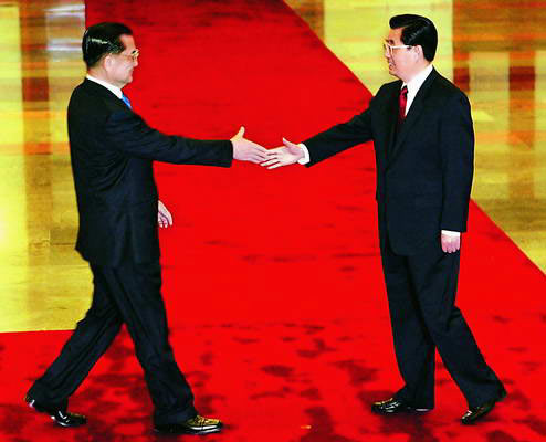 The General Secretary of the Central Committee of the Communist Party of China (CPC) shakes hands with Lien Chan, the visiting chairman of Taiwan's Kuomintang Party, at the Great Hall of People in Beijing on April 29, 2005. Lien Chan said in Beijing that the majority in Taiwan would not accept the policy of 'disunification', aimed at severing ties between the Chinese mainland and Taiwan. 