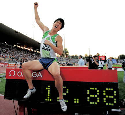 China's Liu Xiang celebrates after breaking the men's 110 meters hurdles world record with a time of 12.88 seconds at a Super Grand Prix meeting on July 12, 2006. Olympic champion Liu jointly held the previous world best of 12.91 seconds with Britain's Colin Jackson, set at the 1993 World Championships in Germany.