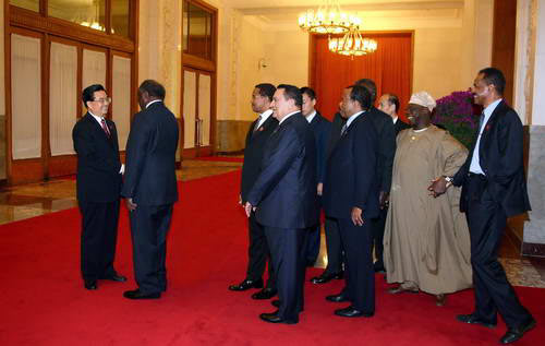 The Beijing Summit of the Sino-African Cooperation Forum closed on November 5, 2006 at the Great Hall of People. Chinese President Hu Jintao shakes hands with African heads of delegations before saying goodbye. 