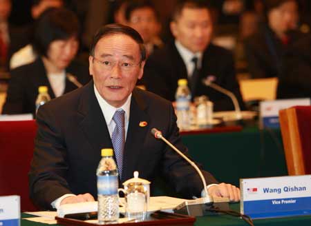 Chinese Vice Premier Wang Qishan, as special representative of president of China, addresses the opening ceremony of the Fifth China-US Strategic Economic Dialogue in Beijing, capital of China, Dec. 4, 2008.  [Xinhua]